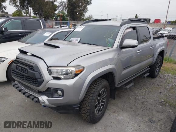 2017 Toyota Tacoma SR5 with VIN 3TMCZ5AN5HM074727, listed as a IAAI auction lot 41976419 with 102,600 mi miles. Bid and sale history available at carsss.com. Image 2.