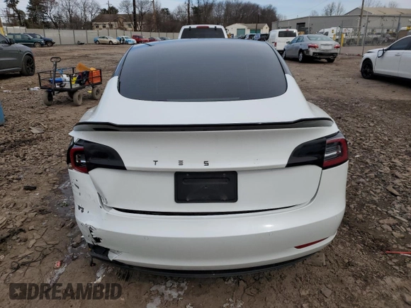 2022 Tesla Model 3 Long Range with VIN 5YJ3E1EB4NF164276, listed as a Copart auction lot 45802865 with 56,836 mi miles and Salvage Title. Bid and sale history available at DreamBid. Image 6.