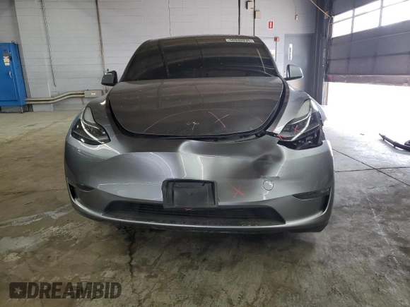 2024 Tesla Model Y Long Range with VIN 7SAYGDEE2RA299824, listed as a Copart auction lot 56040835 with 16,534 mi miles and Salvage title. Bid and sale history available at DreamBid. Image 5.