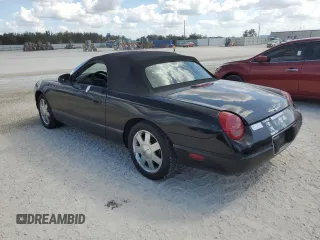 2002 Ford Thunderbird Hardtop Premium with VIN 1FAHP60A12Y120989, listed as a Copart auction lot 77573084 with Not Provided miles and Salvage Title. Bid and sale history available at DreamBid. Image 2.