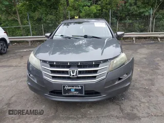 2011 Honda Crosstour EX-L z VIN 5J6TF1H53BL001091, wystawiony jako IAAI lot #42281428 z przebiegiem 154 873 mil mil oraz . Historia ofert i sprzedaży dostępna na DreamBid. Obrazek 12.
