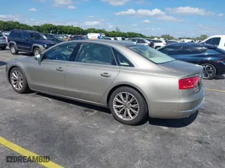 2012 Audi A8 L with VIN WAURVAFD0CN001646, listed as a IAAI auction lot 41524110 with 105,187 mi miles. Bid and sale history available at carsss.com. Image 3.
