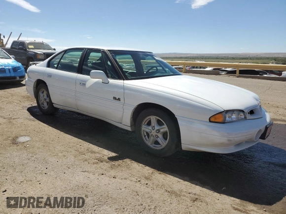1999 Pontiac Bonneville SE z VIN 1G2HX52K3XH226172, wystawiony jako Copart lot #71655164 z przebiegiem 242 429 mil mil oraz Szkoda całkowita • Salvage title. Historia ofert i sprzedaży dostępna na DreamBid. Obrazek 4.