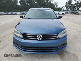 2015 Volkswagen Jetta SE with VIN 3VWD17AJ4FM308841, listed as a Copart auction lot 63437565 with 156,974 mi miles and Salvage title. Bid and sale history available at DreamBid. Image 5.