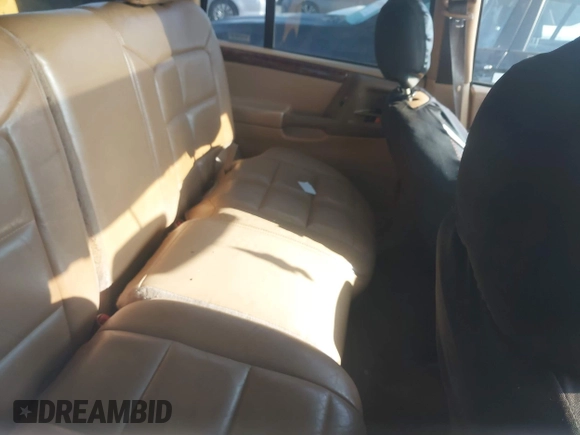 1998 Jeep Grand Cherokee with VIN 1J4FX78S2WC281501, listed as a IAAI auction lot 42140170 with 177,575 mi miles and . Bid and sale history available at DreamBid. Image 8.