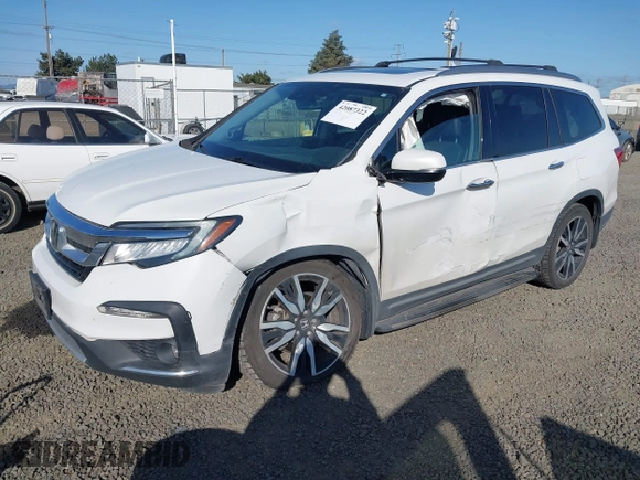 2021 Honda Pilot Touring 8-Passenger with VIN 5FNYF6H92MB031782, listed as a IAAI auction lot 42087322 with 70,062 mi miles and . Bid and sale history available at DreamBid. Image 17.