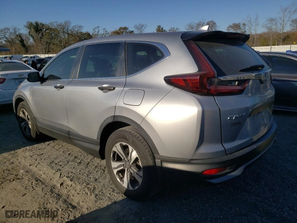 2021 Honda CR-V LX with VIN 5J6RW1H22ML003174, listed as a Copart auction lot 83434654 with 54,043 mi miles and Salvage Title. Bid and sale history available at carsss.com. Image 2.
