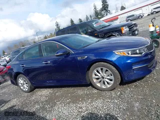 2017 Kia Optima EX with VIN 5XXGU4L39HG162638, listed as a IAAI auction lot 41904299 with 105,864 mi miles. Bid and sale history available at carsss.com. Image 13.