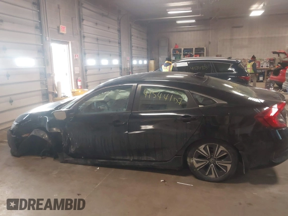 2017 Honda Civic EX-T with VIN 19XFC1E36HE020833, listed as a IAAI auction lot 41544107 with 95,425 mi miles and . Bid and sale history available at DreamBid. Image 14.