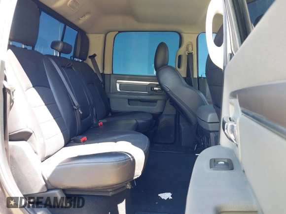 2018 Ram 1500 Lone Star Silver with VIN 1C6RR6LT1JS200095, listed as a IAAI auction lot 41842896 with 99,406 mi miles and . Bid and sale history available at DreamBid. Image 8.