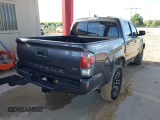 2021 Toyota Tacoma SR5 with VIN 5TFAZ5CN4MX113669, listed as a IAAI auction lot 42468007 with 29,368 mi miles and . Bid and sale history available at DreamBid. Image 4.