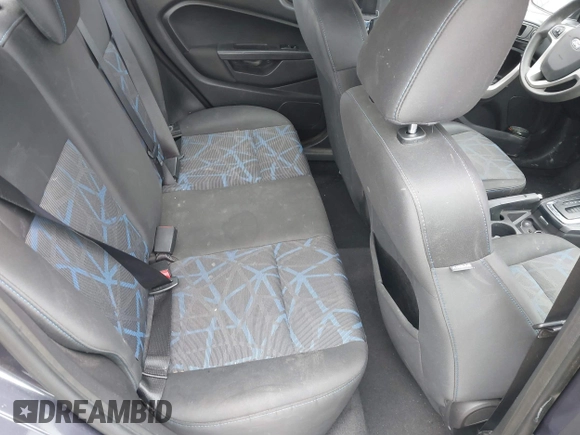 2012 Ford Fiesta SE with VIN 3FADP4BJ3CM152310, listed as a IAAI auction lot 42028398 with 124,530 mi miles and . Bid and sale history available at DreamBid. Image 8.