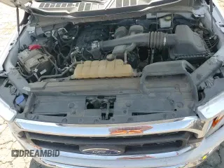 2021 Ford F-150 XL z VIN 1FTEW1CB5MKE44069, wystawiony jako Copart lot #60671425 z przebiegiem 141 290 mil mil oraz Szkoda całkowita • Salvage title. Historia ofert i sprzedaży dostępna na DreamBid. Obrazek 13.