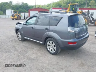 2010 Mitsubishi Outlander z VIN JA4AT3AW9AZ016348, wystawiony jako IAAI lot #42219377 z przebiegiem 104 414 mil mil oraz . Historia ofert i sprzedaży dostępna na DreamBid. Obrazek 3.