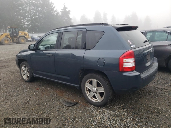 2007 Jeep Compass Sport with VIN 1J8FT470X7D261453, listed as a Copart auction lot 81710234 with 174,118 mi miles and Salvage Title. Bid and sale history available at carsss.com. Image 2.