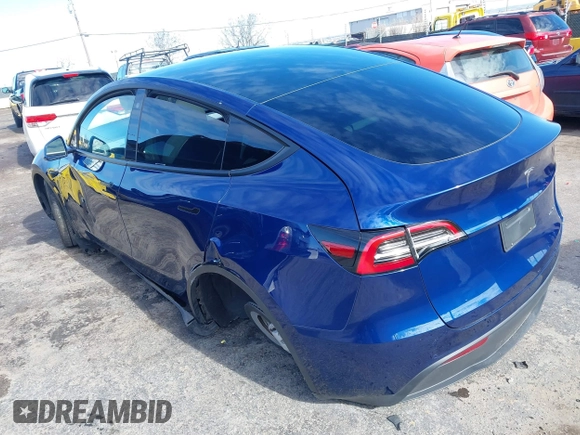 2022 Tesla Model Y Long Range with VIN 7SAYGDEE6NF318372, listed as a IAAI auction lot 41526857 with 26,083 mi miles and . Bid and sale history available at carsss.com. Image 3.