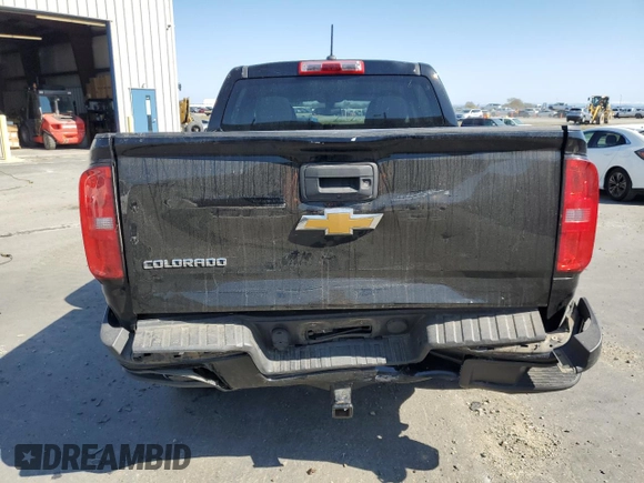 2017 Chevrolet Colorado 2WD WT with VIN 1GCGSBEA7H1238195, listed as a Copart auction lot 48521065 with 142,019 mi miles and Salvage title. Bid and sale history available at DreamBid. Image 6.
