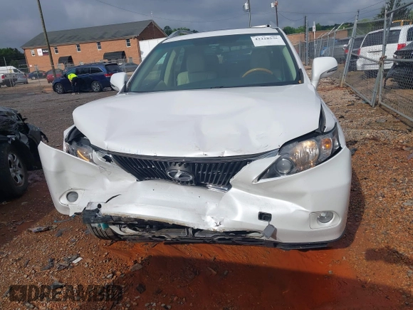 2011 Lexus RX 350 z VIN 2T2BK1BA6BC092170, wystawiony jako IAAI lot #42228576 z przebiegiem 106 828 mil mil oraz . Historia ofert i sprzedaży dostępna na DreamBid. Obrazek 12.