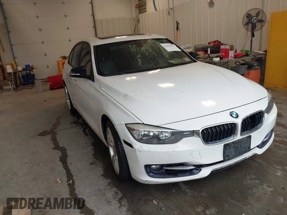 2014 BMW 3 Series 328i xDrive with VIN WBA3B5C53EP543964, listed as a IAAI auction lot 41856923 with 149,440 mi miles. Bid and sale history available at carsss.com. Image 1.