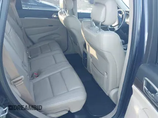 2014 Jeep Grand Cherokee Limited with VIN 1C4RJEBT0EC513098, listed as a IAAI auction lot 41324750 with 213,306 mi miles and . Bid and sale history available at DreamBid. Image 8.