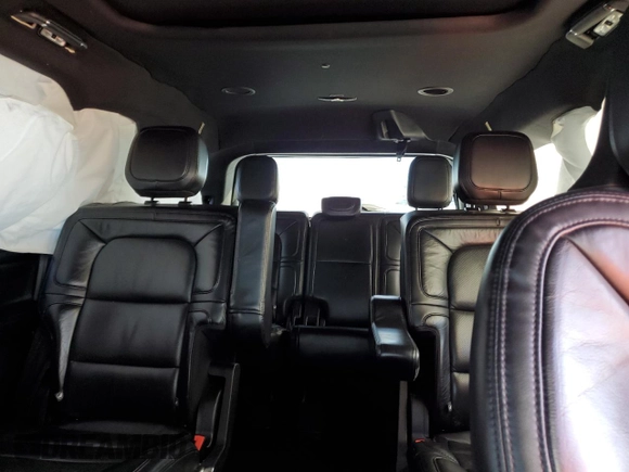 2021 Lincoln Navigator Reserve z VIN 5LMJJ2KT3MEL04879, wystawiony jako Copart lot #45593625 z przebiegiem 96 396 mil mil oraz Czysty tytuł • Clean title. Historia ofert i sprzedaży dostępna na DreamBid. Obrazek 10.