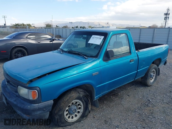 1995 Mazda B-Series Truck z VIN 4F4CR12A0STM09915, wystawiony jako IAAI lot #41773728 z przebiegiem 90 000 mil mil oraz . Historia ofert i sprzedaży dostępna na DreamBid. Obrazek 2.