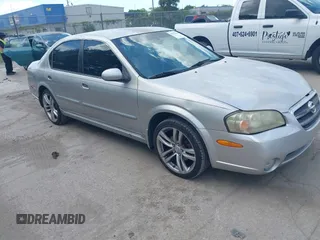 2003 Nissan Maxima GLE z VIN JN1DA31AX3T424167, wystawiony jako IAAI lot #42522365 z przebiegiem 181 907 mil mil oraz . Historia ofert i sprzedaży dostępna na DreamBid. Obrazek 1.