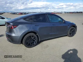 2023 Tesla Model Y Long Range with VIN 7SAYGDEE9PF638742, listed as a Copart auction lot 48188455 with 30,550 mi miles and Salvage Title. Bid and sale history available at DreamBid. Image 3.