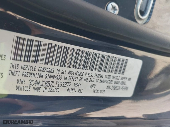 2020 Jeep Compass Latitude w/Sun/Safety Pkg with VIN 3C4NJCBB7LT133977, listed as a IAAI auction lot 40950290 with 71,428 mi miles. Bid and sale history available at carsss.com. Image 9.