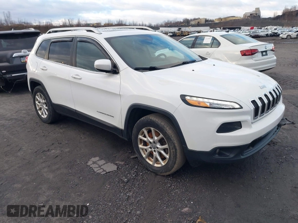 2016 Jeep Cherokee Latitude z VIN 1C4PJMCB7GW118036, wystawiony jako IAAI lot #41232593 z przebiegiem 114 880 mil mil oraz . Historia ofert i sprzedaży dostępna na DreamBid. Obrazek 1.