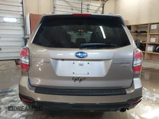 2014 Subaru Forester 2.5i Touring with VIN JF2SJAPC3EH541727, listed as a IAAI auction lot 41812809 with 94,506 mi miles. Bid and sale history available at carsss.com. Image 17.