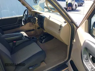 2003 Ford Ranger XL Fleet с VIN 1FTYR44V63PA17810, выставлен на аукционе IAAI как лот 42016102 с пробегом 51 784 миль миль и . История ставок и продаж доступна на DreamBid. Изображение 5.