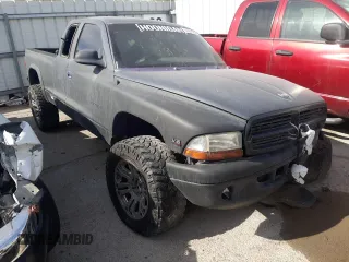 2000 Dodge Dakota SLT with VIN 1B7GG22X1YS655459, listed as a Copart auction lot 84569564 with 240,478 mi miles and Non Repairable. Bid and sale history available at DreamBid. Image 4.