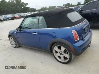 2007 MINI Convertible S with VIN WMWRH33567TJ45123, listed as a Copart auction lot 55702735 with 60,117 mi miles and Salvage title. Bid and sale history available at DreamBid. Image 2.