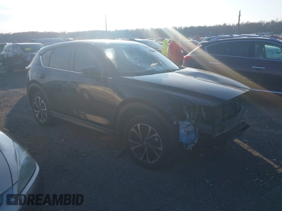 2022 Mazda CX-5 2.5 S Premium Package with VIN JM3KFBDM1N1537243, listed as a IAAI auction lot 40871911 with 77,725 mi miles. Bid and sale history available at carsss.com. Image 1.