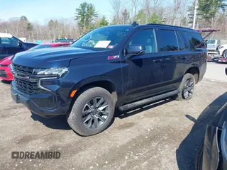 2021 Chevrolet Tahoe Z71 with VIN 1GNSKPKD4MR228894, listed as a IAAI auction lot 42083391 with 40,181 mi miles and . Bid and sale history available at DreamBid. Image 2.