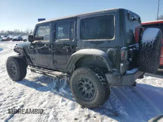 2013 Jeep Wrangler Unlimited Sport with VIN 1C4BJWDG7DL621806, listed as a Copart auction lot 87604805 with 158,885 mi miles and Salvage title. Bid and sale history available at DreamBid. Image 2.