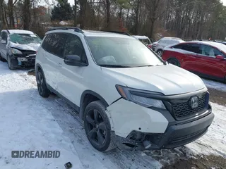 2021 Honda Passport Elite with VIN 5FNYF8H05MB037296, listed as a IAAI auction lot 41261153 with 40,215 mi miles. Bid and sale history available at carsss.com. Image 1.