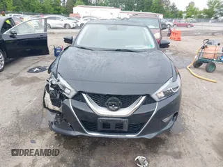 2017 Nissan Maxima SV z VIN 1N4AA6AP1HC364881, wystawiony jako IAAI lot #42251177 z przebiegiem 148 210 mil mil oraz . Historia ofert i sprzedaży dostępna na DreamBid. Obrazek 12.