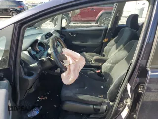 2009 Honda Fit Sport z VIN JHMGE88409S052668, wystawiony jako Copart lot #56142275 z przebiegiem 118 445 mil mil oraz Szkoda całkowita • Salvage title. Historia ofert i sprzedaży dostępna na DreamBid. Obrazek 7.