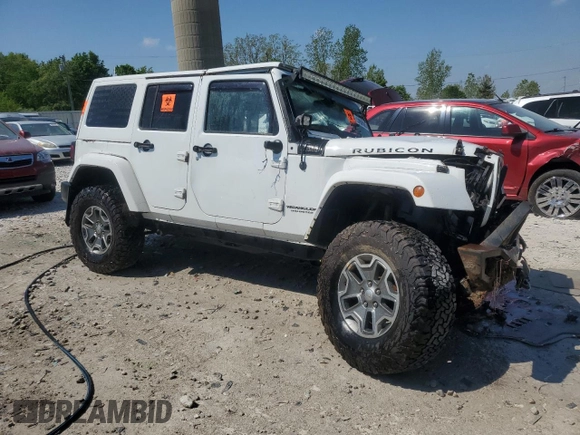 2015 Jeep Wrangler Unlimited Rubicon with VIN 1C4BJWFG7FL533533, listed as a Copart auction lot 55998005 with Not provided miles and Clean title. Bid and sale history available at DreamBid. Image 4.
