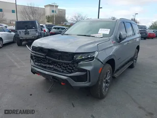 2022 Chevrolet Tahoe Z71 with VIN 1GNSKPKD3NR265727, listed as a IAAI auction lot 41212836 with 15,435 mi miles. Bid and sale history available at carsss.com. Image 2.