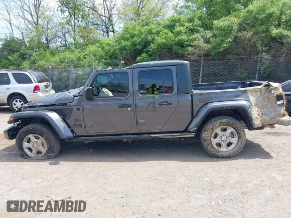 2021 Jeep Gladiator Freedom with VIN 1C6HJTAG3ML557932, listed as a IAAI auction lot 42150245 with 26,656 mi miles and . Bid and sale history available at DreamBid. Image 15.