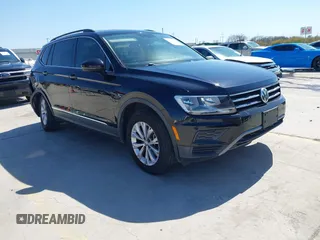 2018 Volkswagen Tiguan SEL with VIN 3VV3B7AX3JM064061, listed as a IAAI auction lot 41772564 with 95,395 mi miles and . Bid and sale history available at DreamBid. Image 1.