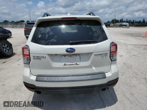 2017 Subaru Forester Touring with VIN JF2SJGWC2HH594766, listed as a Copart auction lot 50199083 with 51,189 mi miles and . Bid and sale history available at DreamBid. Image 6.