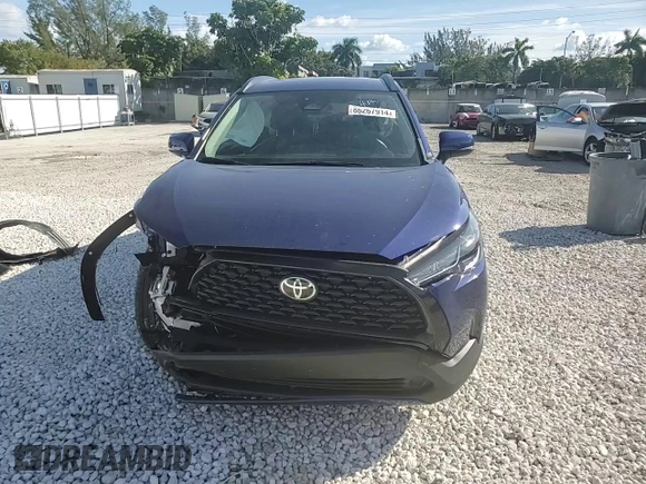 2023 Toyota Corolla Cross LE with VIN 7MUCAAAG0PV063737, listed as a Copart auction lot 86267914 with 13,740 mi miles and Salvage title. Bid and sale history available at DreamBid. Image 14.