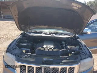 2012 Jeep Grand Cherokee Overland with VIN 1C4RJECT7CC105614, listed as a IAAI auction lot 41629174 with 264,756 mi miles. Bid and sale history available at carsss.com. Image 10.