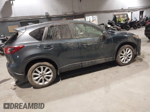 2013 Mazda CX-5 Grand Touring with VIN JM3KE2DE3D0128449, listed as a IAAI auction lot 41161558 with 108,618 mi miles. Bid and sale history available at carsss.com. Image 4.