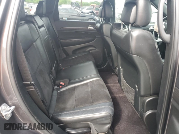 2017 Jeep Grand Cherokee Altitude z VIN 1C4RJFAG9HC720250, wystawiony jako Copart lot #56956155 z przebiegiem 138 879 mil mil oraz Szkoda całkowita • Salvage title. Historia ofert i sprzedaży dostępna na DreamBid. Obrazek 11.