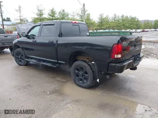 2014 Ram 2500 SLT with VIN 3C6TR5DT5EG248078, listed as a IAAI auction lot 41954325 with 69,033 mi miles. Bid and sale history available at carsss.com. Image 3.